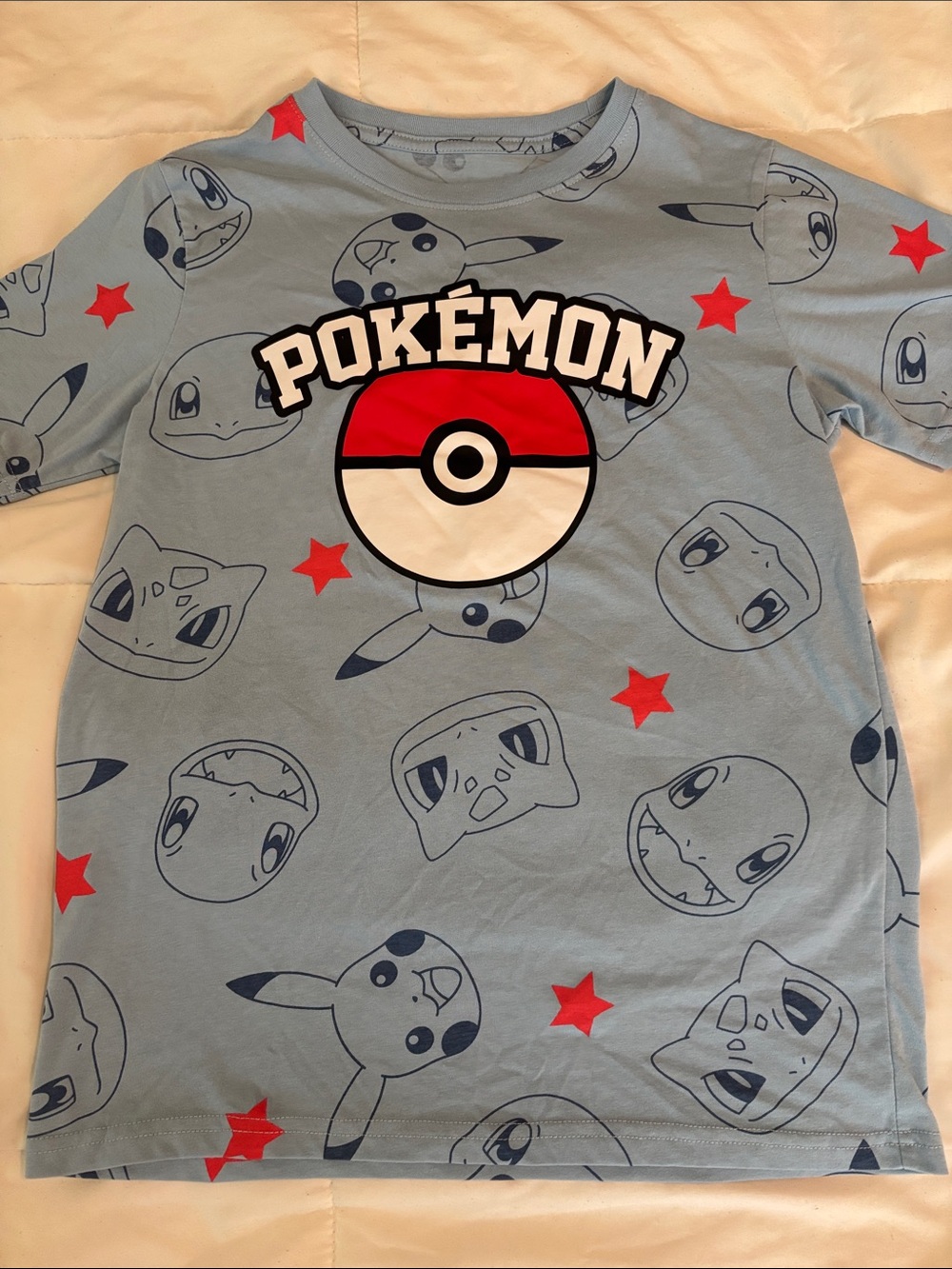 Pokemon Light Blue Short Sleeve Tee with Poké Ball and Red Star Accents